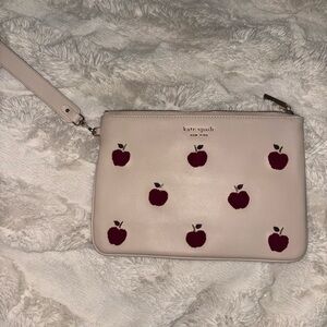 Kate Spade Beige Wristlet with Red Apple Design